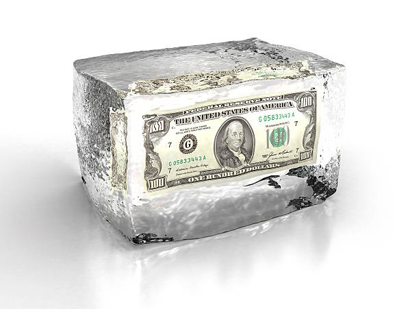 100 dollar bill frozen in ice cube